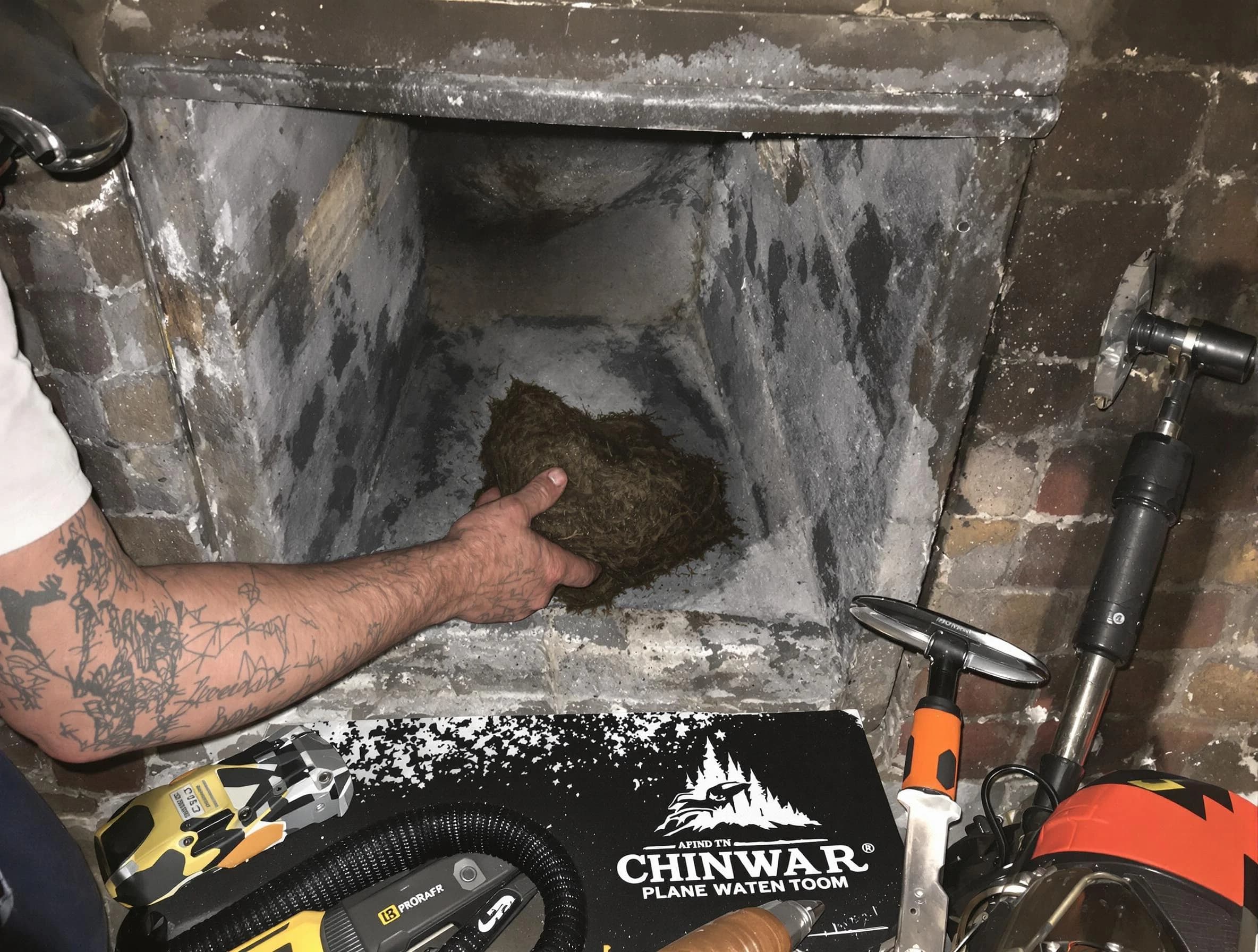 Lawrenceville Chimney Sweep safely removing debris and screening chimney in Lawrenceville, GA