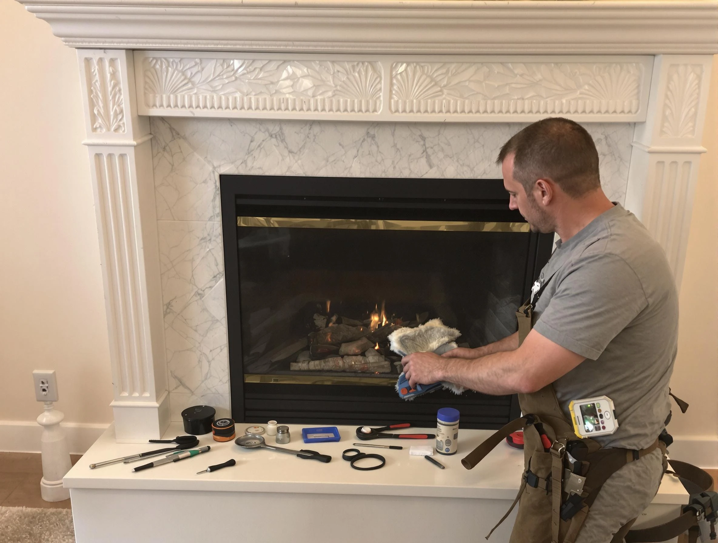 Lawrenceville Chimney Sweep performing fireplace maintenance in Lawrenceville, GA